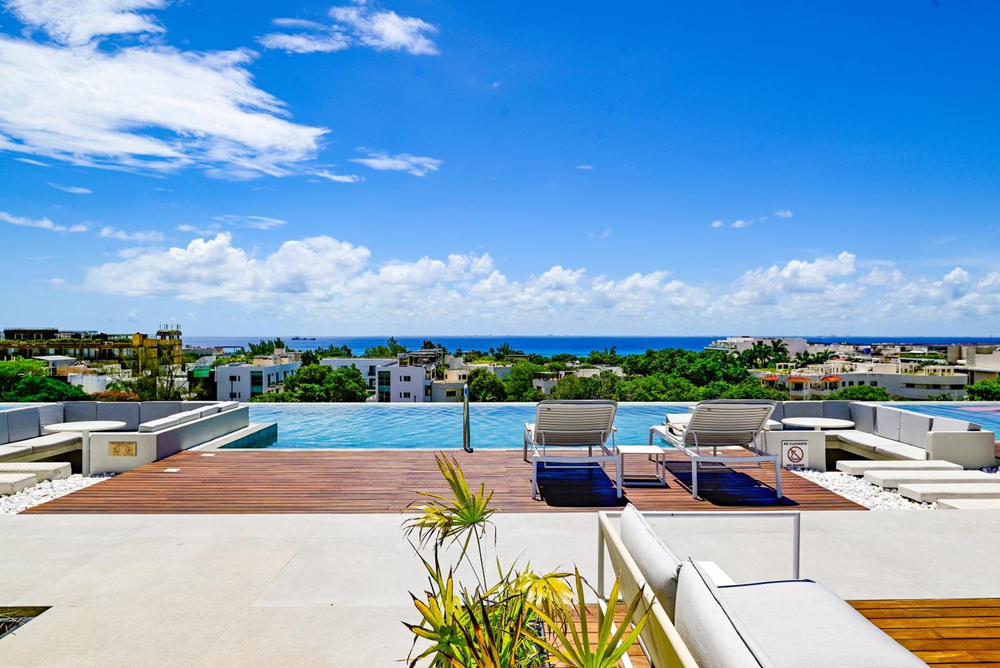 Aloft Playa Del Carmen Hotell Exteriör bild Rooftop pool at the Ritz-Carlton, Dorado Beach, Puerto Rico
